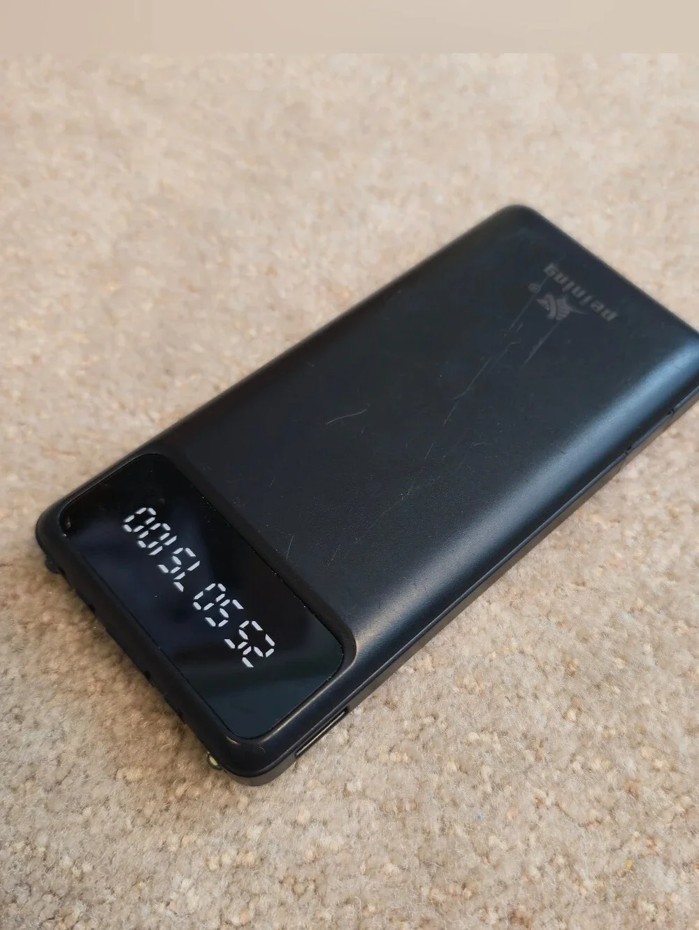Peining brand portable power bank featuring a digital LED display